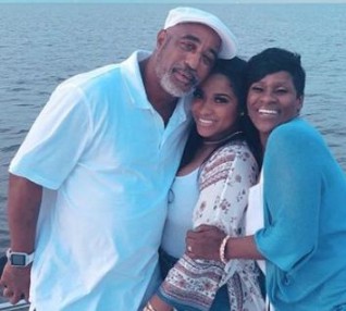 Anita Johnson Andrews with her husband and daughter.